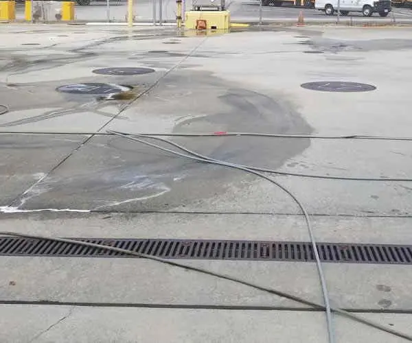 Parking spaces before and after pressure washing (Oct 2018)