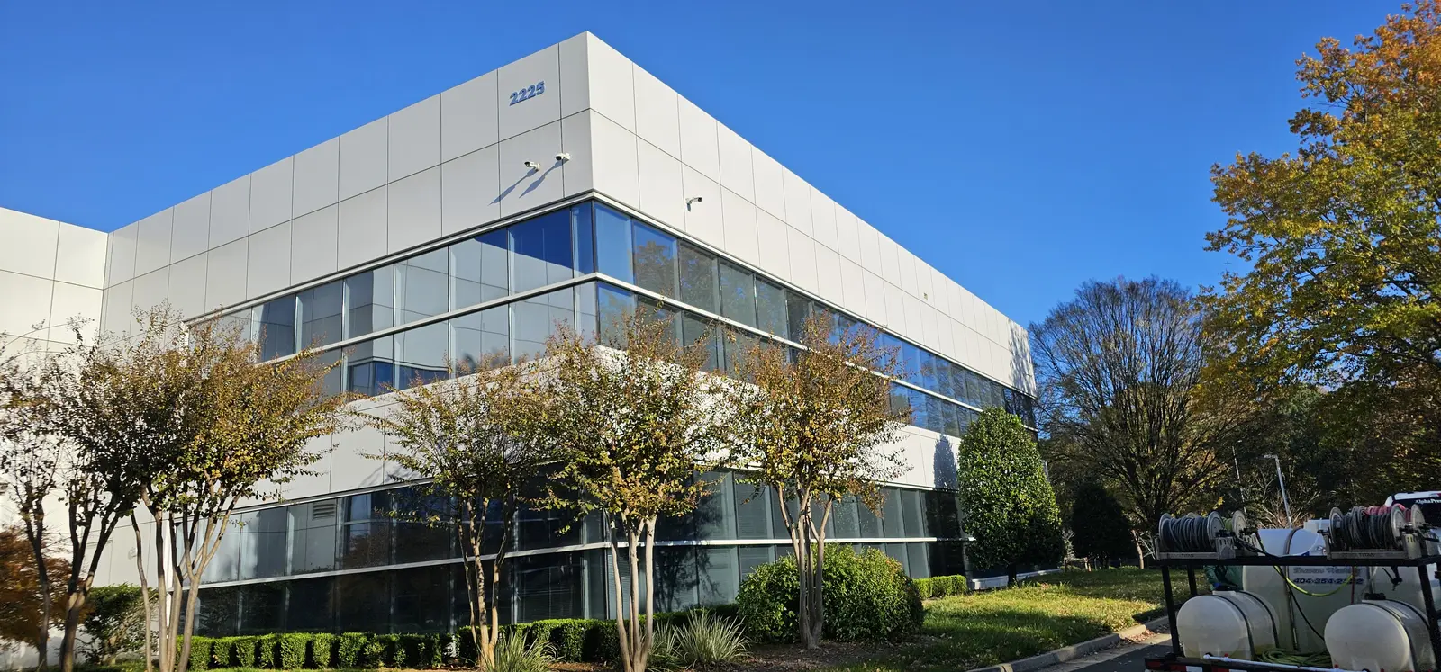 Office building exterior during a wall and glass wash, Northwest Parkway Southeast, Northwest Business Center, Marietta, GA (Nov 2024)