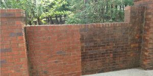 brick wall before and after pressure washing